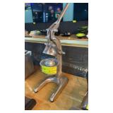 Citrus squeezer on stand