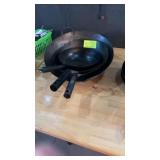 4 assorted woks
