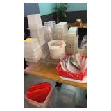 Large lot of assorted plastic inserts and lids