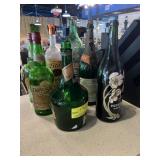 Seven oversize display bottles