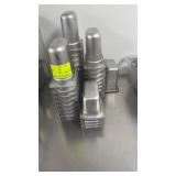 35 assorted stainless steel inserts