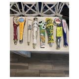 Eight assorted beer handles