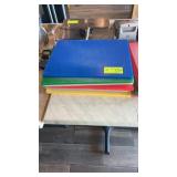 Nine assorted color cutting boards