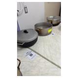 Three assorted pots with two lids