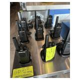 Lot of walkie-talkie radios chargers, etc.