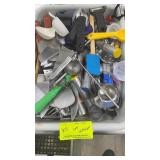 Basket of assorted kitchen utensils