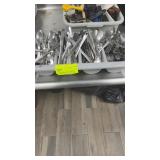 Lot of silverware with caddy