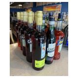 13 assorted cordial bottles