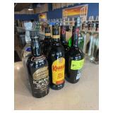 Eight assorted cordial bottles