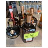 Five cordial bottles