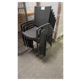 Five wicker Luk outdoor dining chairs with arms