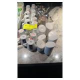 Lot of assorted espresso cups milk pitches and