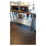 Stainless steel table with stainless steel under
