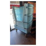 Lot of assorted clean linen with laundry bin