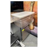 Three full-size food storage containers with