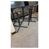 Five metal table bases