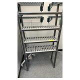 Plastic shelving unit with four shelves 3 foot