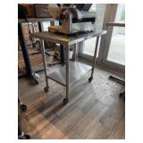 Stainless steel table on casters with stainless