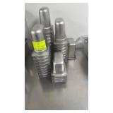 35 assorted stainless steel inserts