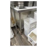 Stainless steel table on casters with cutting