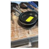 Eight assorted small pans