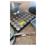 Two muffin pans 24 count per pan