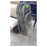 Four metal folding chairs