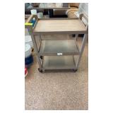 Rolling plastic bus cart with three shelves
