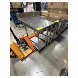 Stainless steel work table with 4 inch backsplash