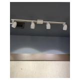10 SECTIONS OF TRACK LIGHTING WITH 25 HEADS