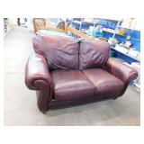 BROWN LEATHER LOVE SEAT WITH ROLLED ARMS
