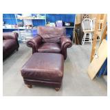 BROWN LEATHER ROLLED ARM CHAIR & OTTOMAN