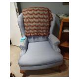 Upholstered Chair with Afghan
