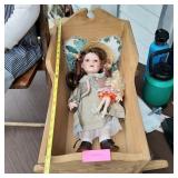 Porcelain Doll and Cradle