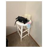 Stool, Fanny Pack and Lighted Candles