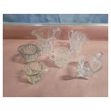 Assorted cream and sugar bowls