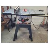 Craftsman 10inch table saw with rip fence. Works.
