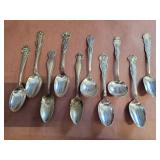 Collection of sterling and silver plated spoons.