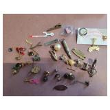 Pins, pendants, tie clasps and