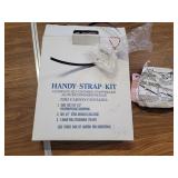 Handy-Strap-Kit . Open box.