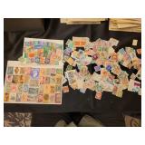 Assorted US and international stamps.