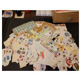 Postage stamps torn from envelopes