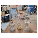 Oil lamps. Clear glass. 18 & 12ins.