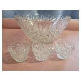 Glass punch bowl with 3 matching glasses. 6x12