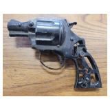 Toy cap gun.