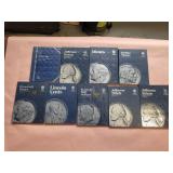 US coin folders. All are empty.