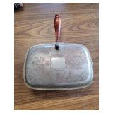 Silver plated Silent butler with wood handle.
