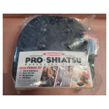 Pro-Shiatsu massaging pillow. Battery operated.