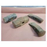 Sledgehammer and splitting axe heads.