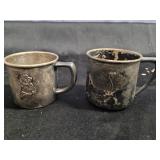 Silver plated baby cups.